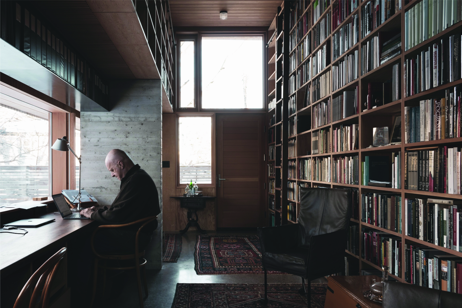 Interior of project, showing library and desk space